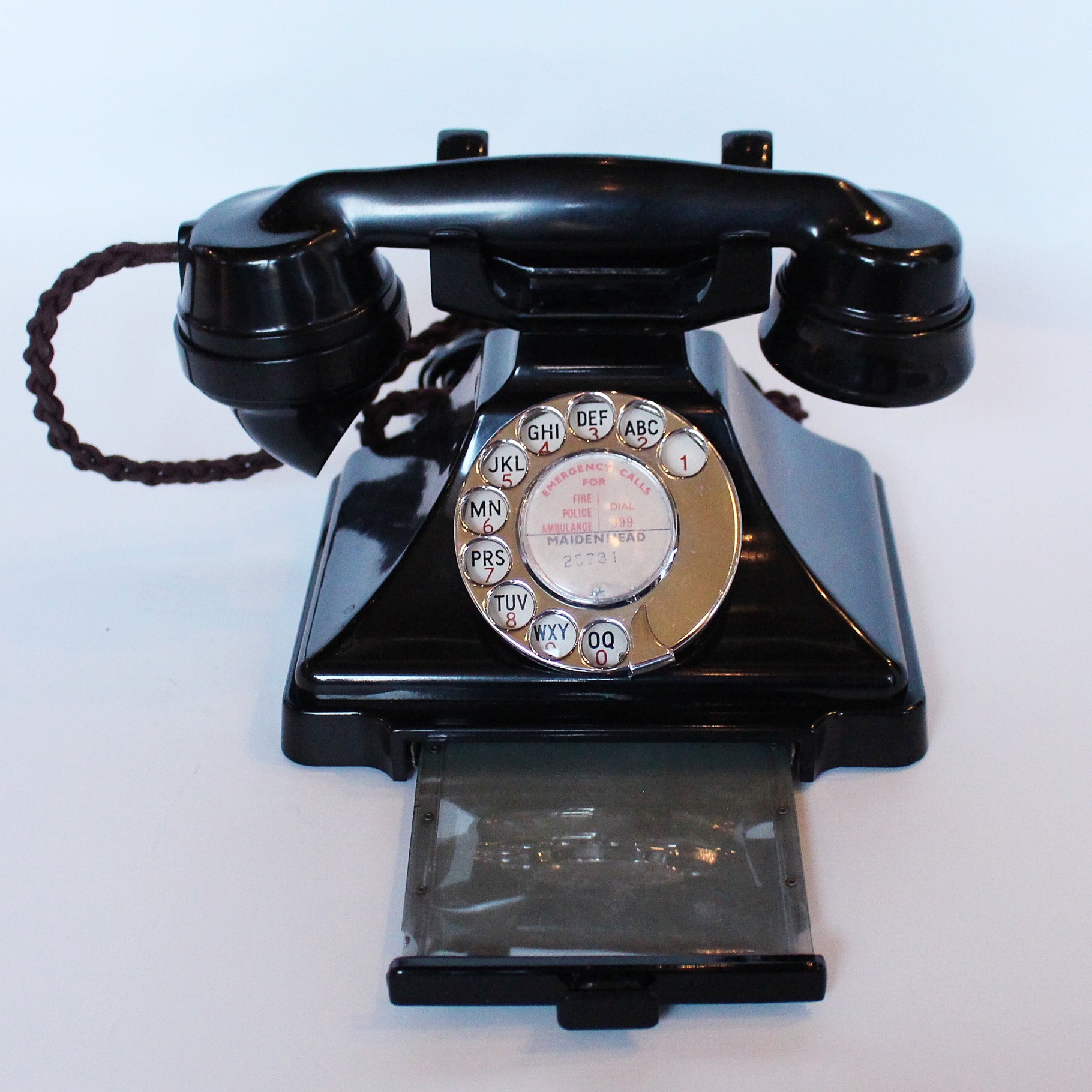 An original GPO telephone in black bakelite. With integral drawer at Jeroen Markies.