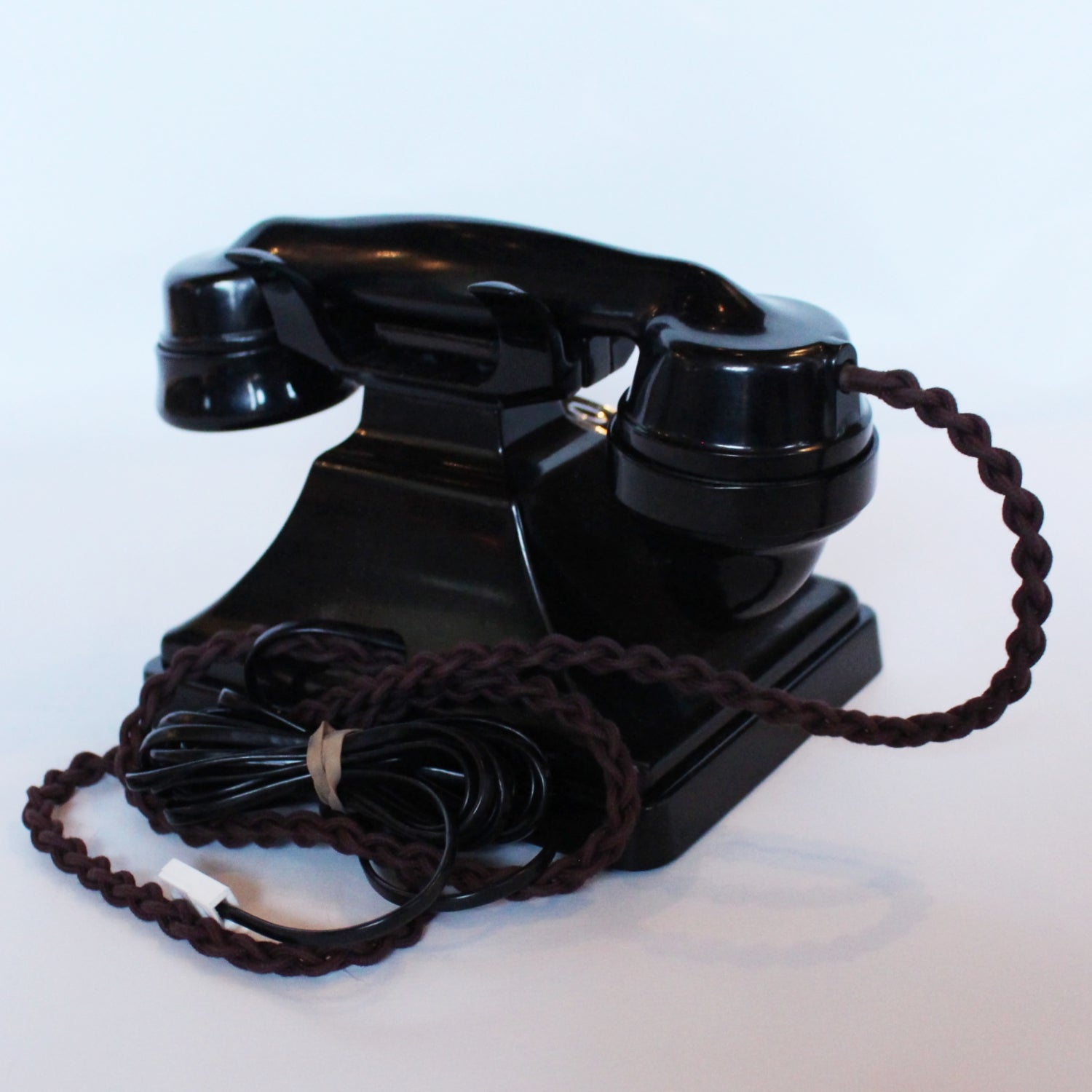 An original GPO telephone in black bakelite. With integral drawer at Jeroen Markies.