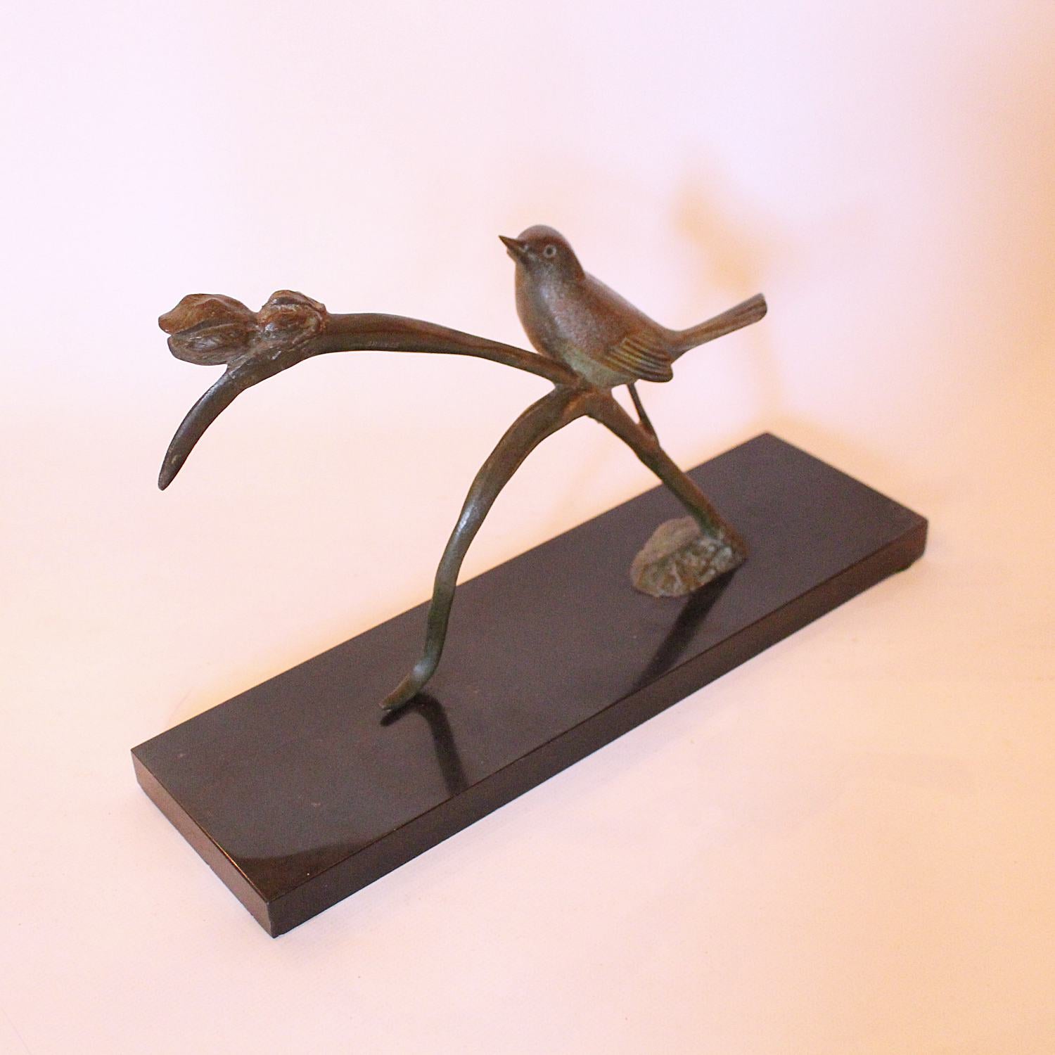 Irene Rochard Art Deco bronze bird perched on a tulip at Jeroen Markies