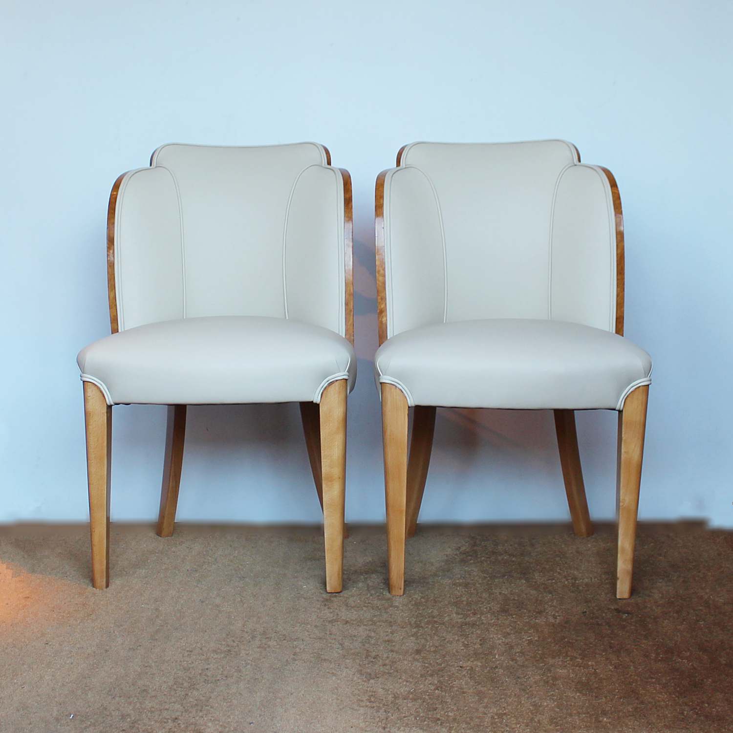 A pair of Art Deco cloud back chairs by Harry & Lou Epstein