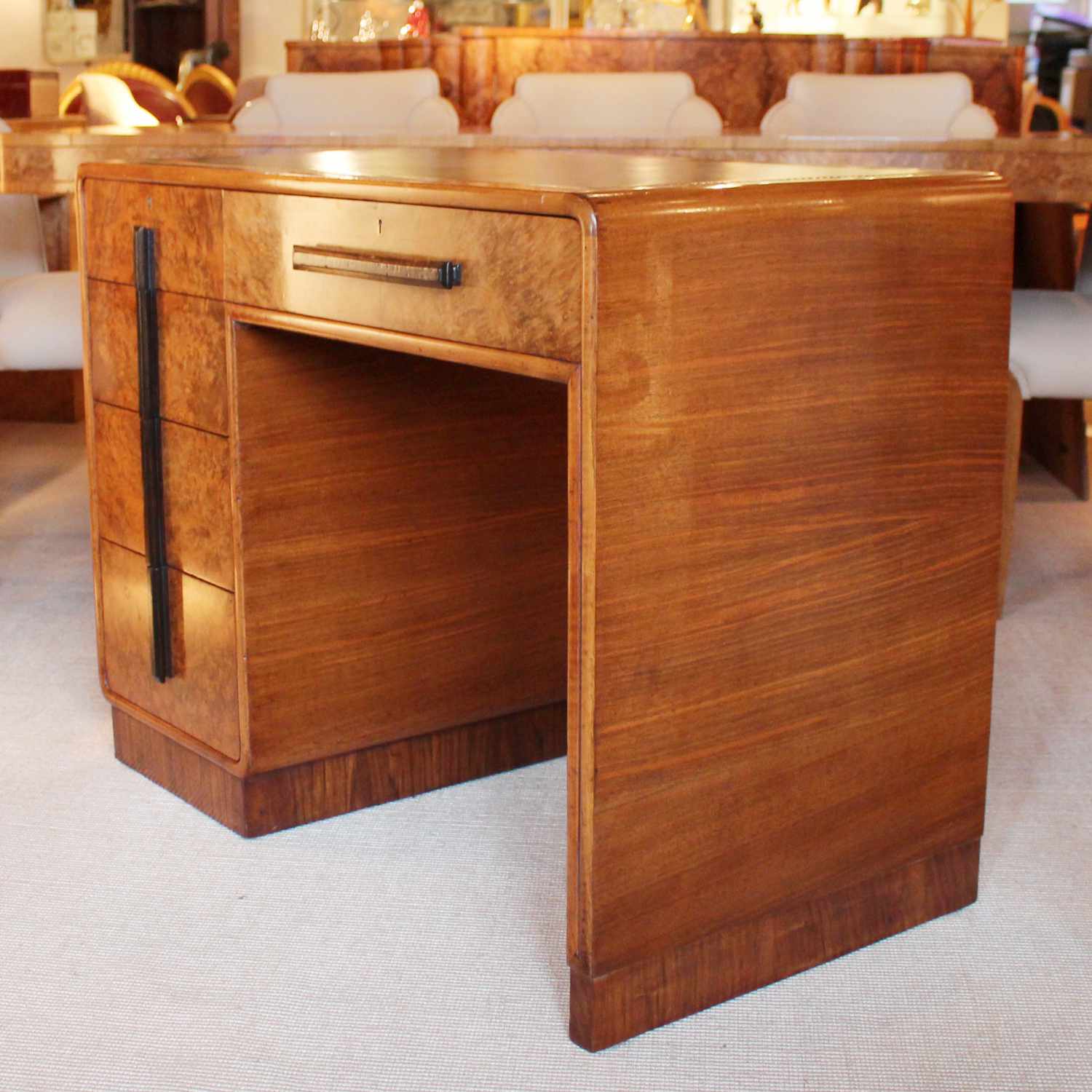 Art deco writing desk by Hamptons of London in burr walnut with leather top at Jeroen Markies