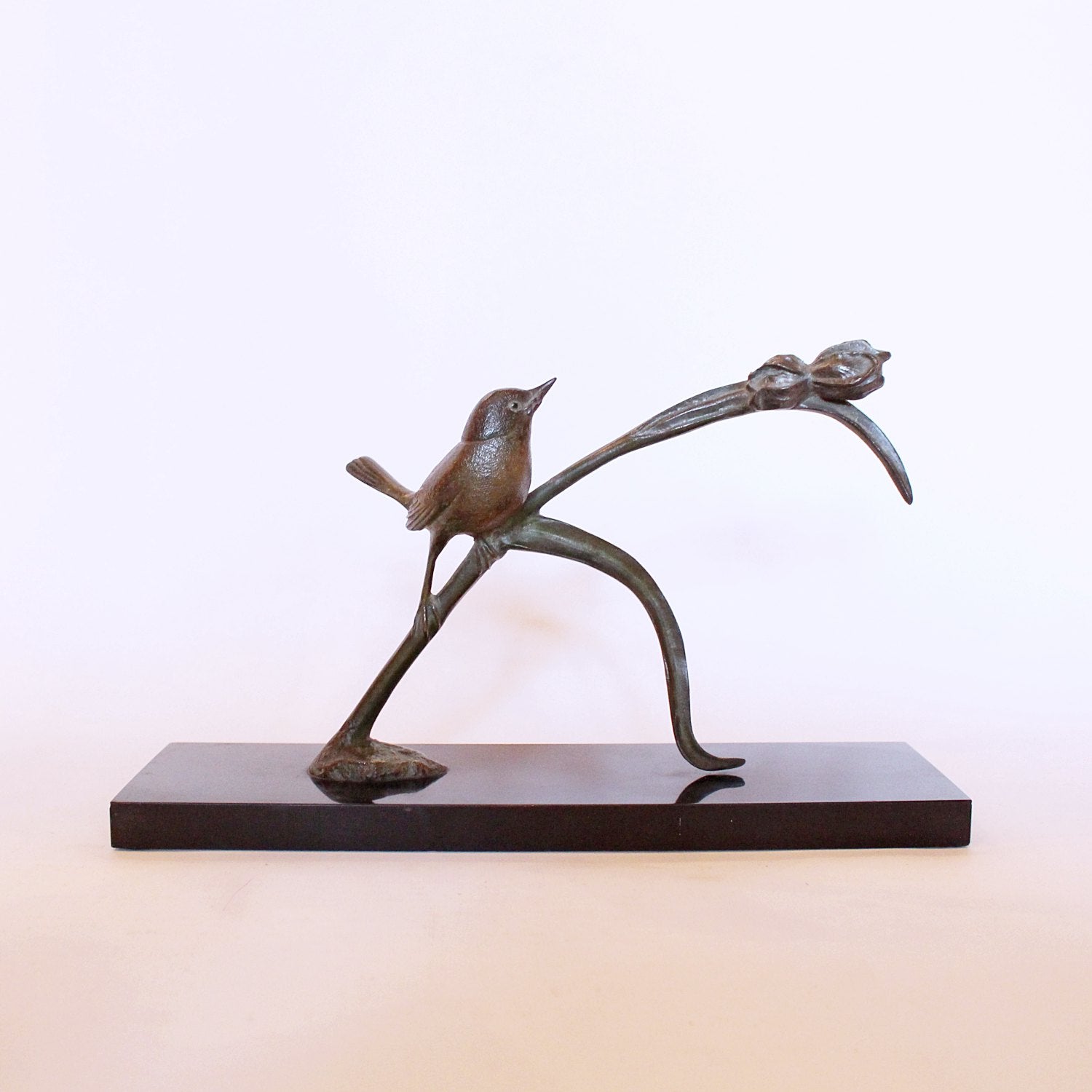 Irene Rochard Art Deco bronze bird perched on a tulip at Jeroen Markies