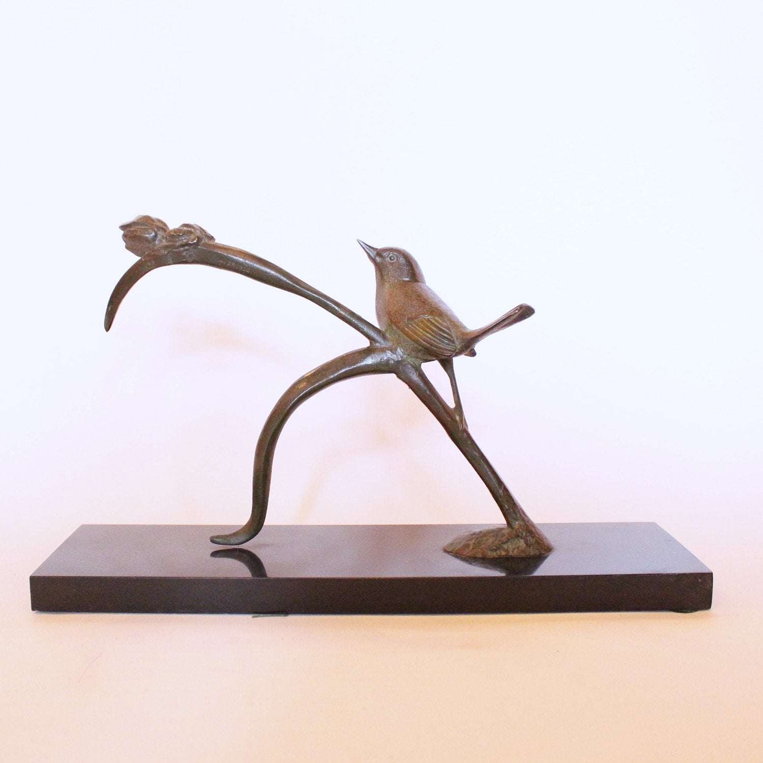 Irene Rochard Art Deco bronze bird perched on a tulip at Jeroen Markies