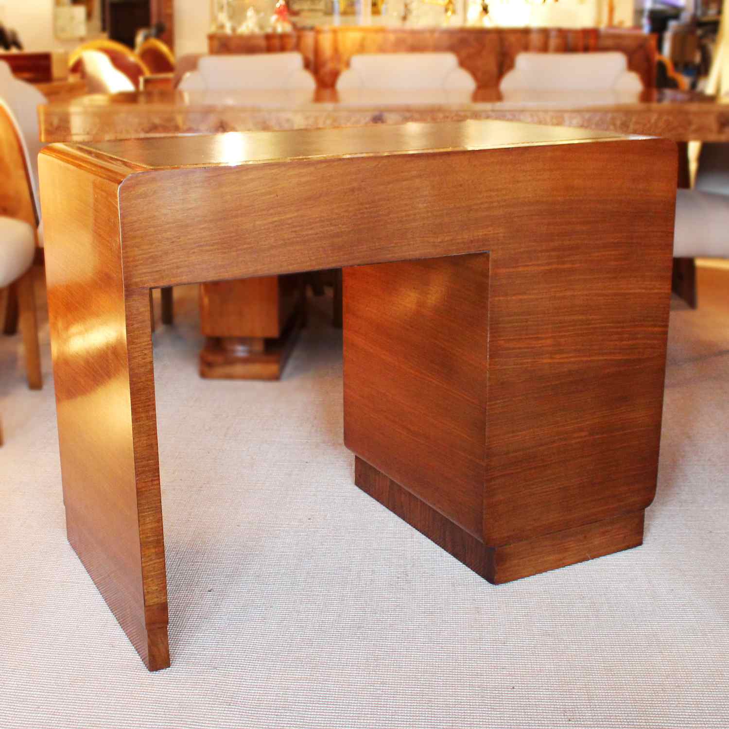 Art deco writing desk by Hamptons of London in burr walnut with leather top at Jeroen Markies