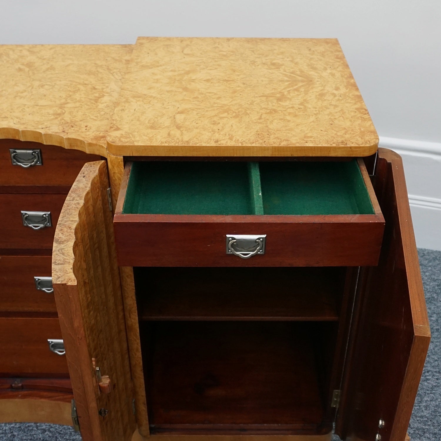 Art Deco Sideboard by Harry & Lou Epstein English Circa 1930 veneered in burr walnut with original bakelite handles. Vintage Art Deco - Jeroen Markies Art Deco