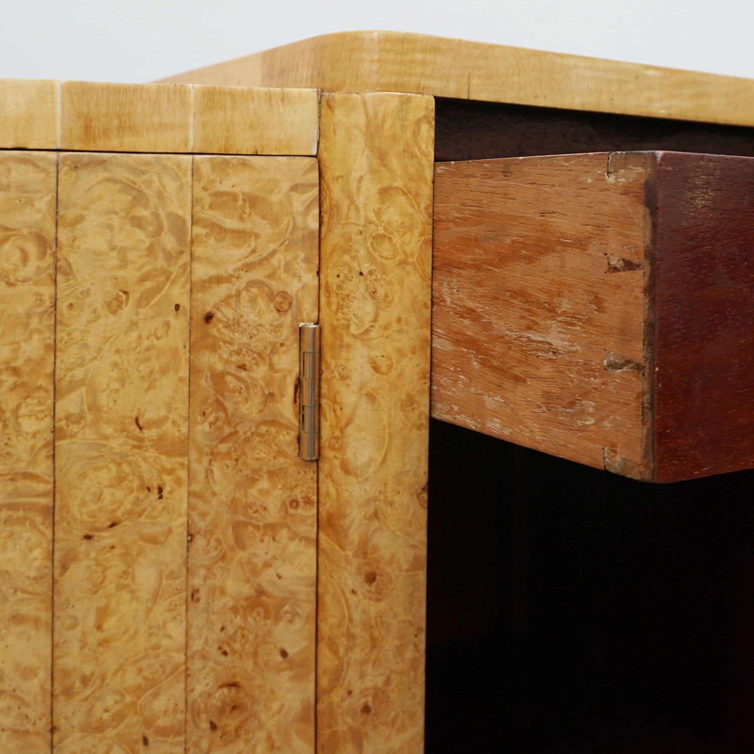 Art Deco Sideboard by Harry & Lou Epstein English Circa 1930 veneered in burr walnut with original bakelite handles. Vintage Art Deco - Jeroen Markies Art Deco