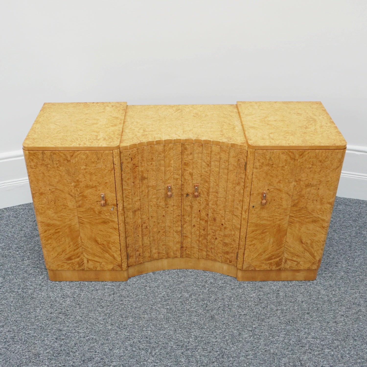 Art Deco Sideboard by Harry & Lou Epstein English Circa 1930 veneered in burr walnut with original bakelite handles. Vintage Art Deco - Jeroen Markies Art Deco