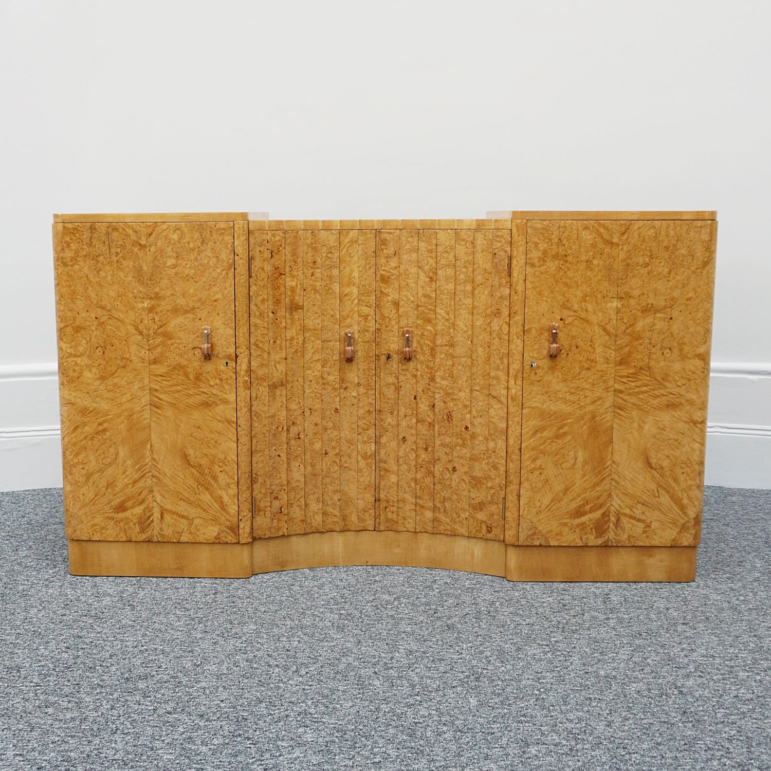 Art Deco Sideboard by Harry & Lou Epstein English Circa 1930 veneered in burr walnut with original bakelite handles. Vintage Art Deco - Jeroen Markies Art Deco
