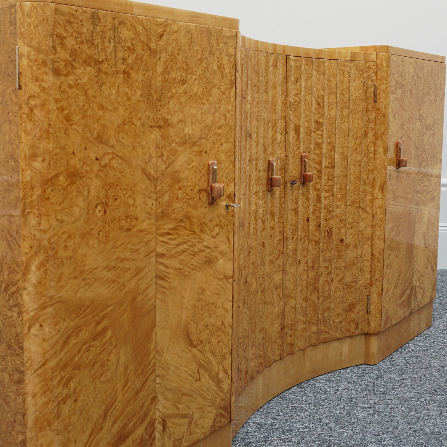 Art Deco Sideboard by Harry & Lou Epstein English Circa 1930 veneered in burr walnut with original bakelite handles. Vintage Art Deco - Jeroen Markies Art Deco