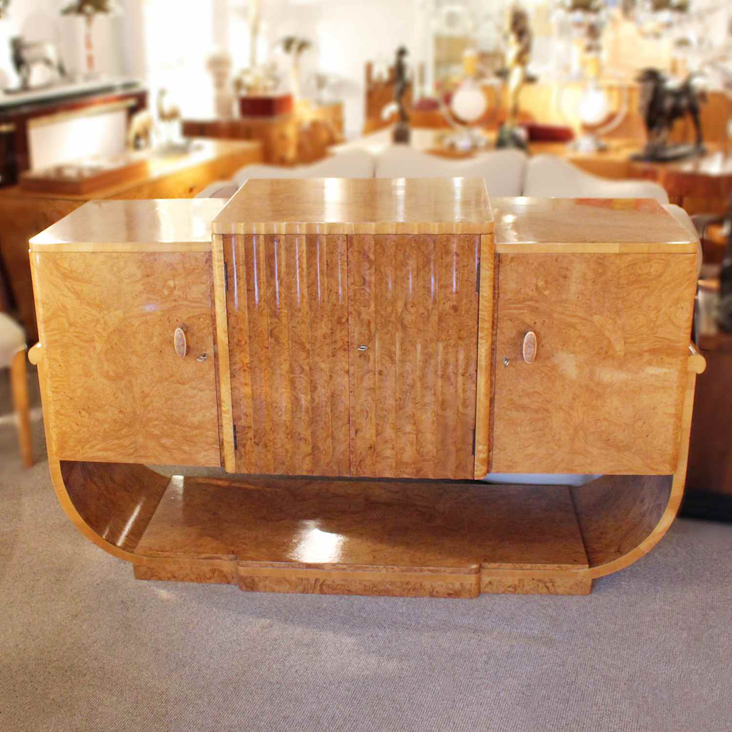 Epstein Art Deco sideboard in figured walnut with u-shaped base