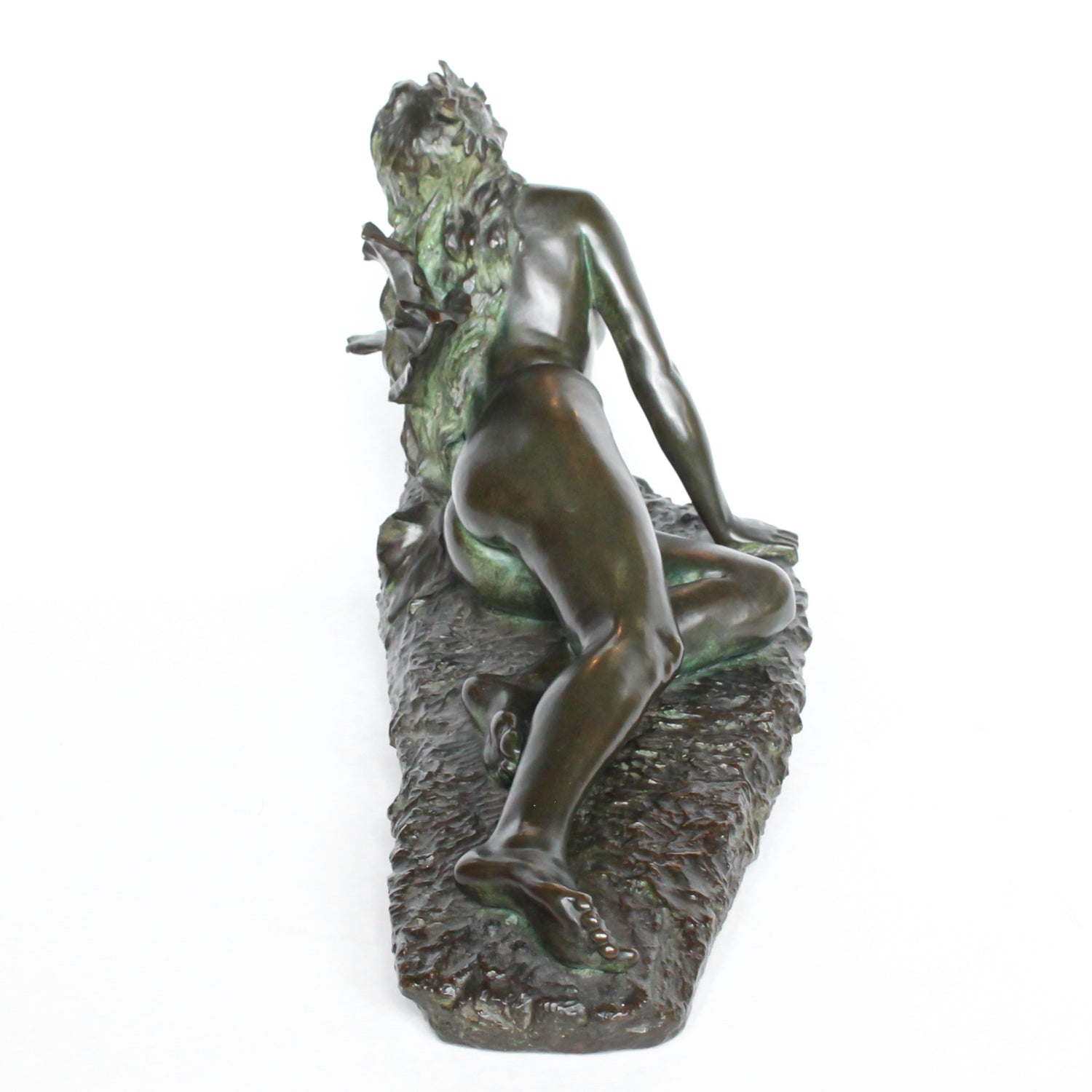 Clytie, a verdigris patinated bronze sculpture by François Louis Virieux (19th and 20thC). Depicts Clytie, the nymph infatuated with Helios, god of the sun. She eventually became a sunflower because, like the flower, she followed her unrequited love with her gaze wherever he went at Jeroen Markies.