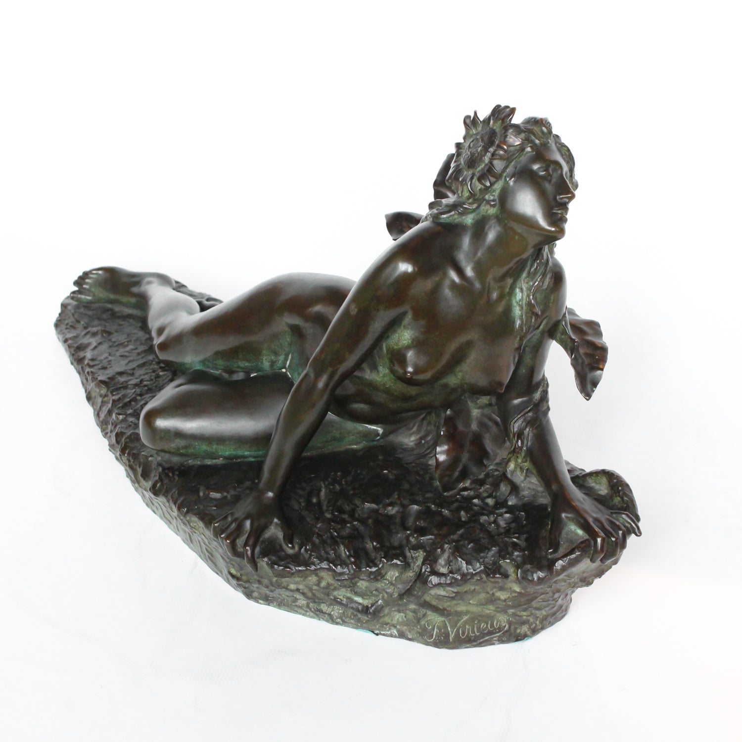 Clytie, a verdigris patinated bronze sculpture by François Louis Virieux (19th and 20thC). Depicts Clytie, the nymph infatuated with Helios, god of the sun. She eventually became a sunflower because, like the flower, she followed her unrequited love with her gaze wherever he went at Jeroen Markies.