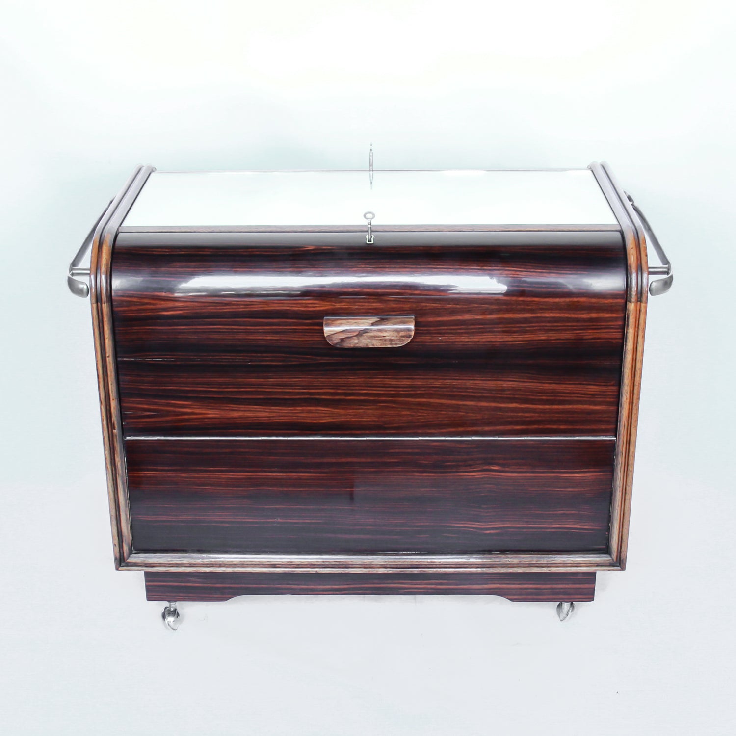 An Art Deco serving/drinks trolley with mirrored top.
