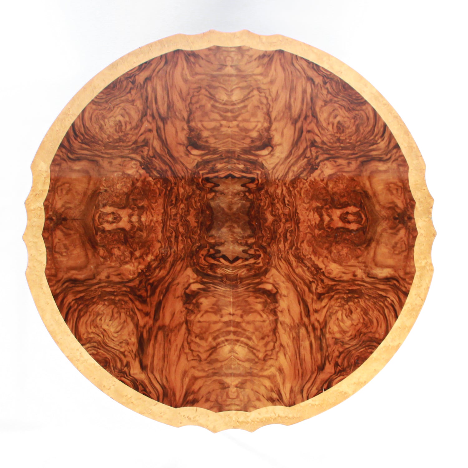 Art Deco, figured walnut veneer nest of tables. A shaped table with cross-footed base and four integral side tables. Burr and straight grain walnut throughout with birdseye maple border.