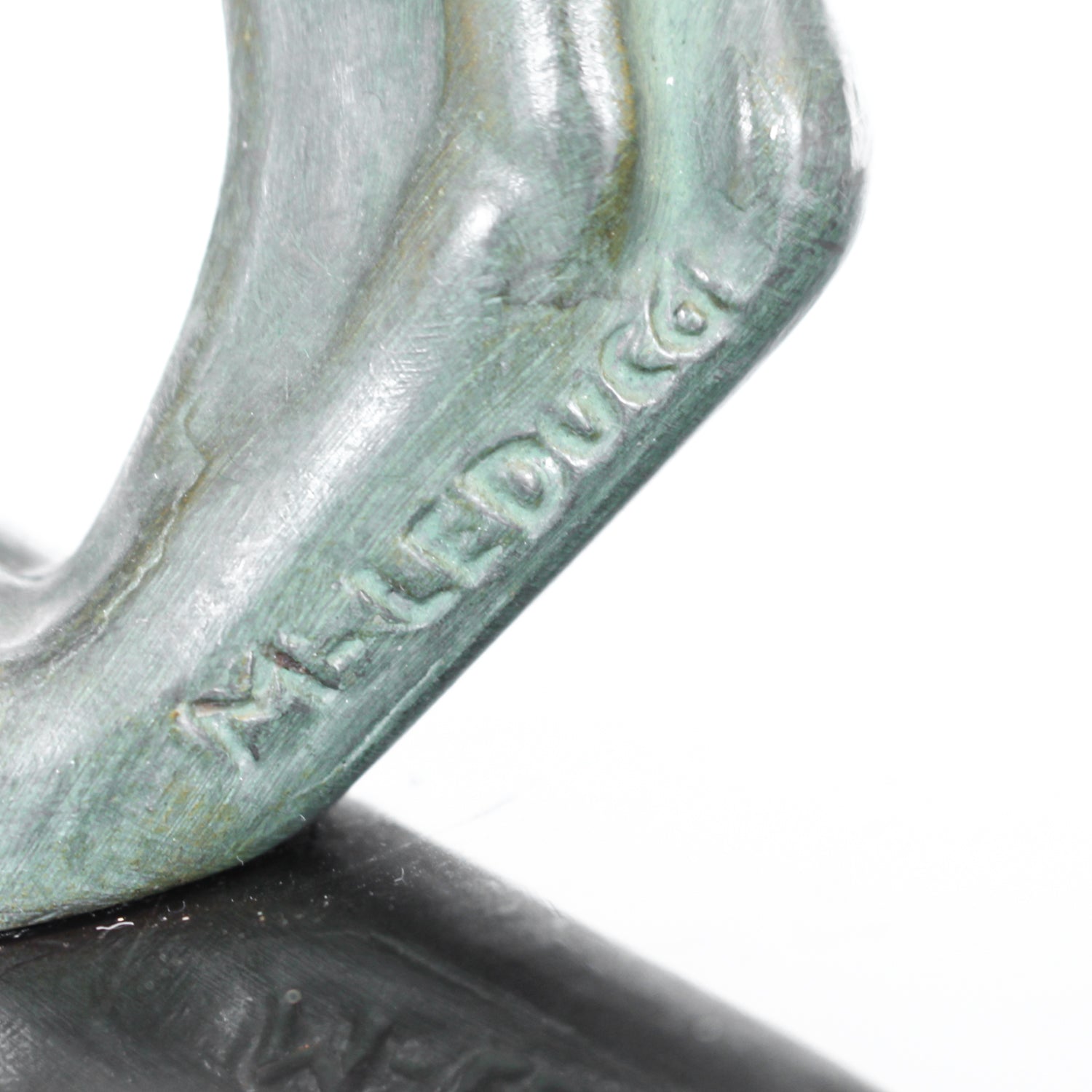 An Art Deco, patinated bronze study of a prowling lioness, mounted on a black marble base. Signed 'M. Leduc' at Jeroen Markies.