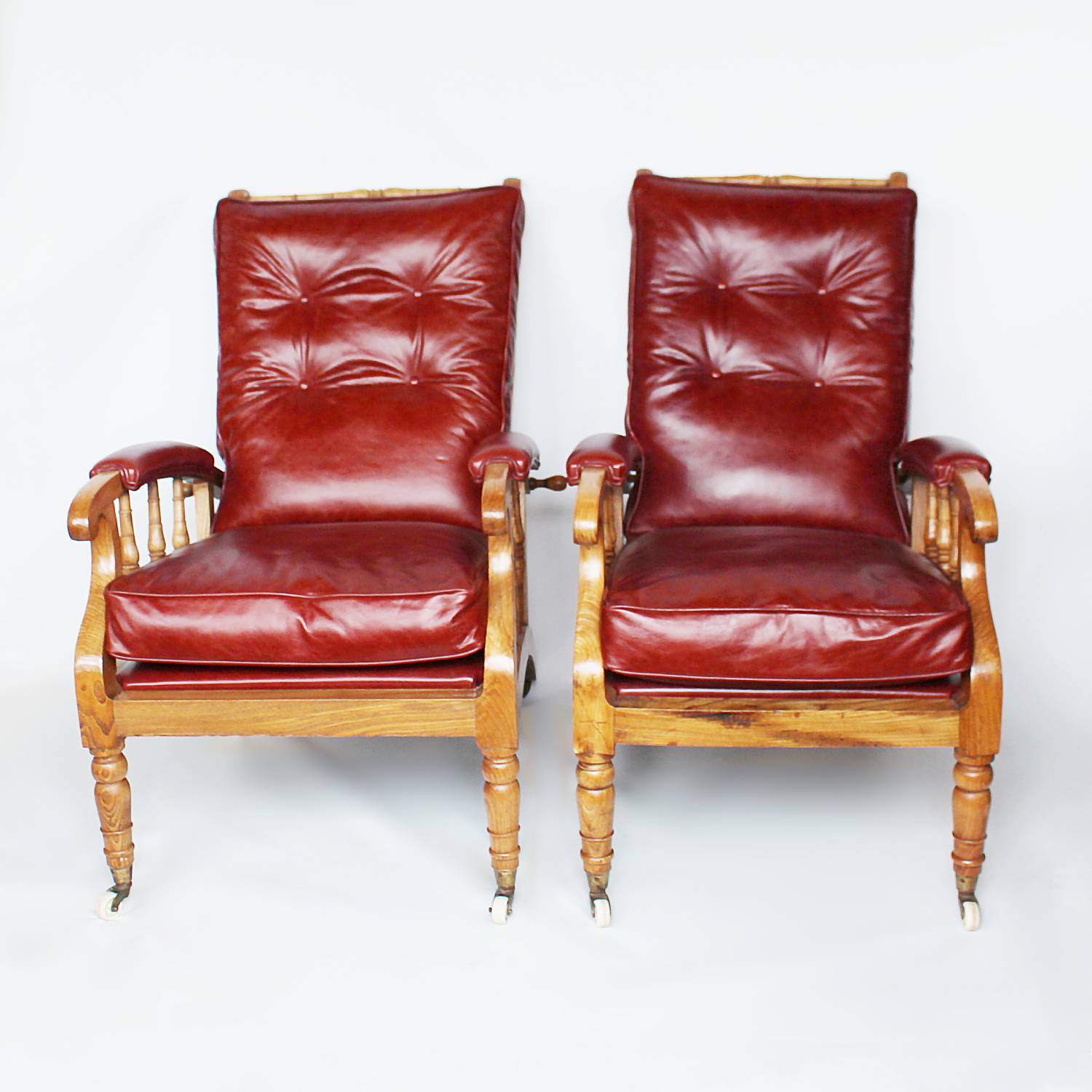 A pair of Philip Webb Arts & Crafts reclining armchairs circa 1900
