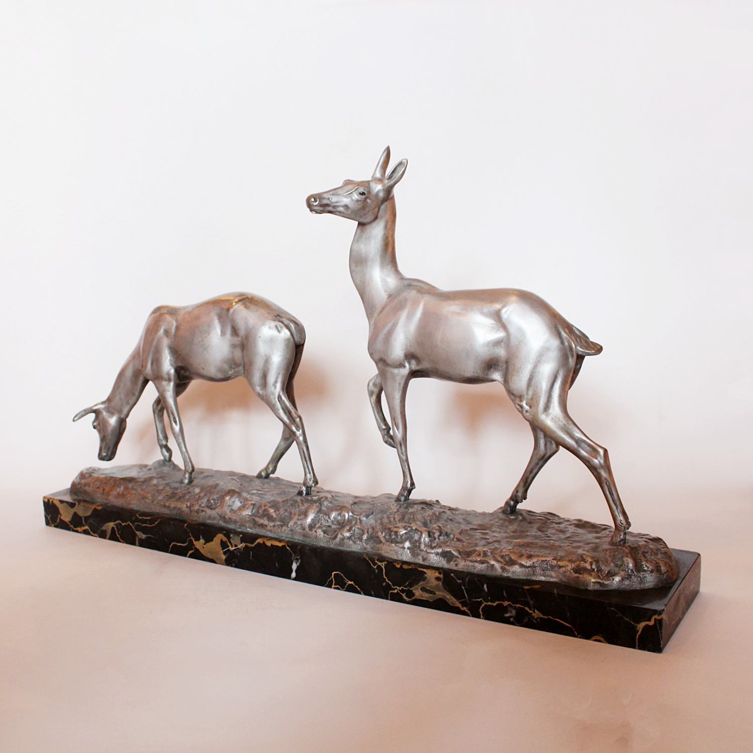 A pair of Art Deco silvered bronze deer by Irene Richard at Jeroen Markies