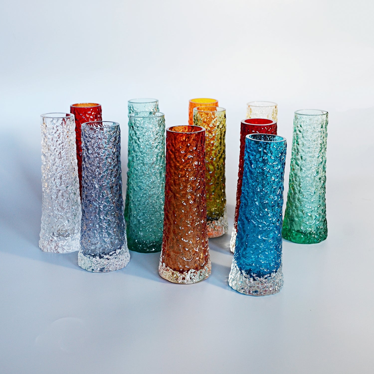 Collection of Twelve Textured 'Chimney' Bark Vases