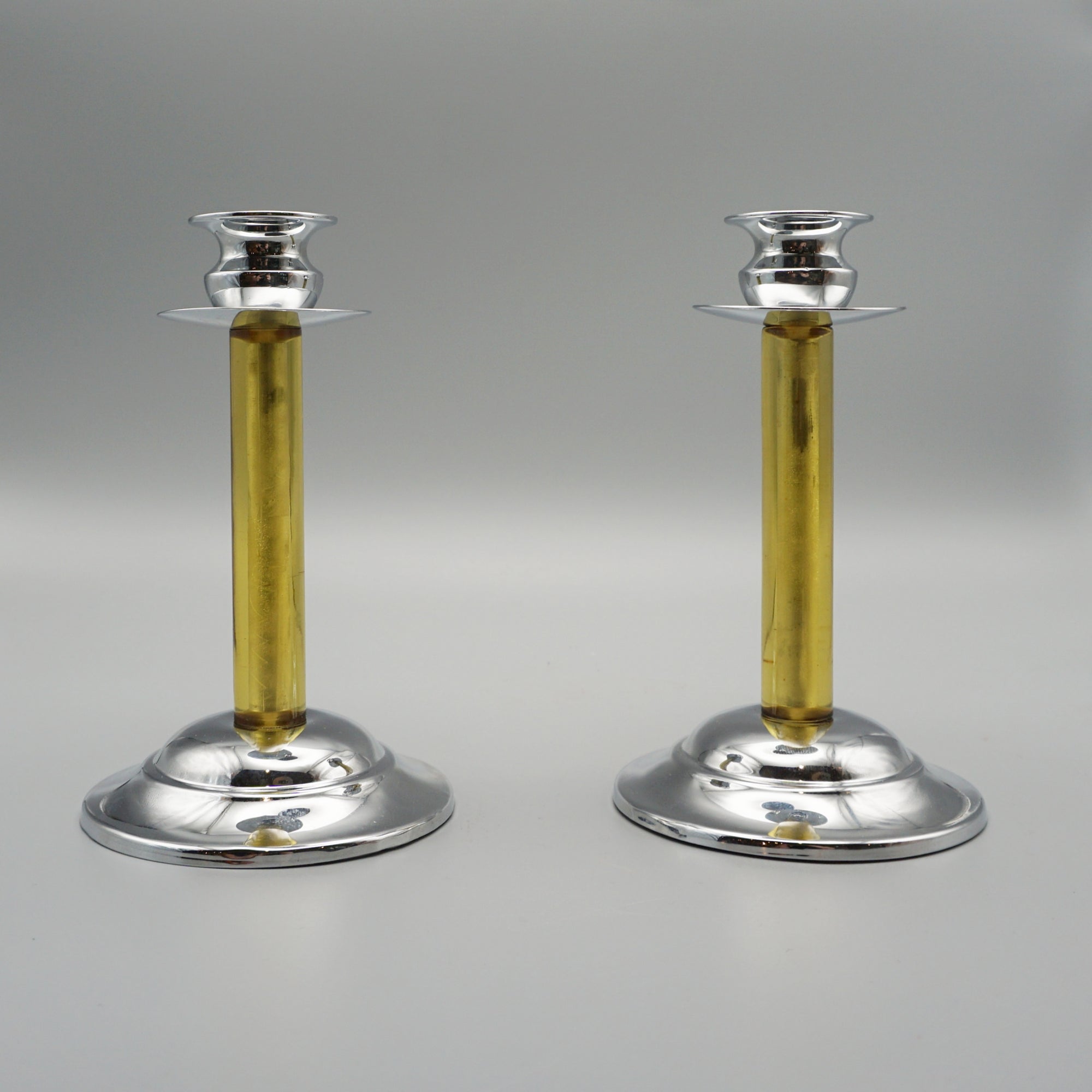  Pair of Art Deco bakelite and chromed metal candlesticks - Jeroen Markies Art Deco 
