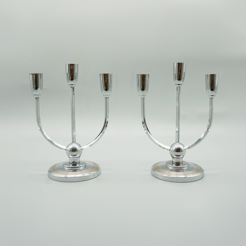 A pair of Mid-century chromed metal candelabrums&nbsp; set over a circular base - Jeroen Markies Art Deco 