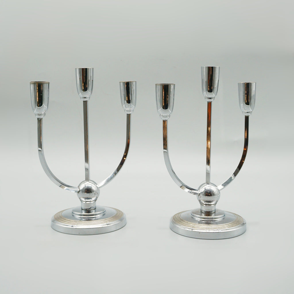 A pair of Mid-century chromed metal candelabrums&nbsp; set over a circular base - Jeroen Markies Art Deco 