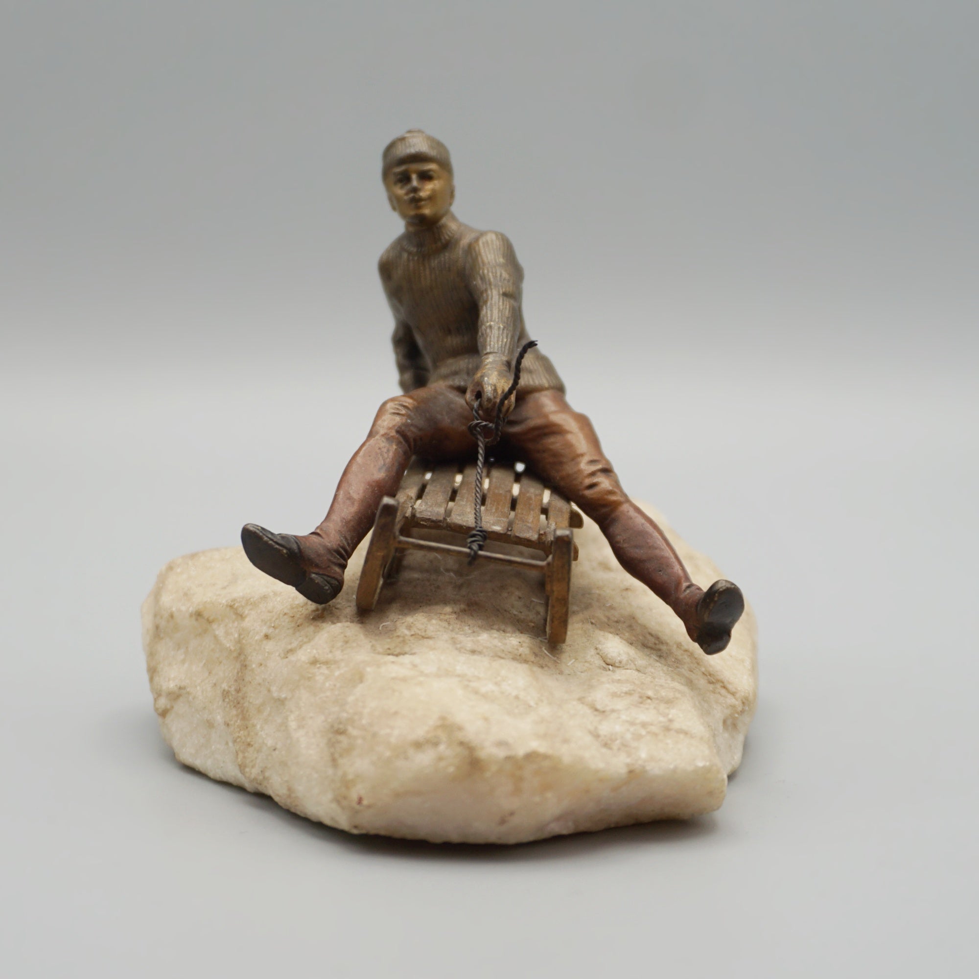 Franz Bergman Bronze Figure of a Man Riding a Sledge