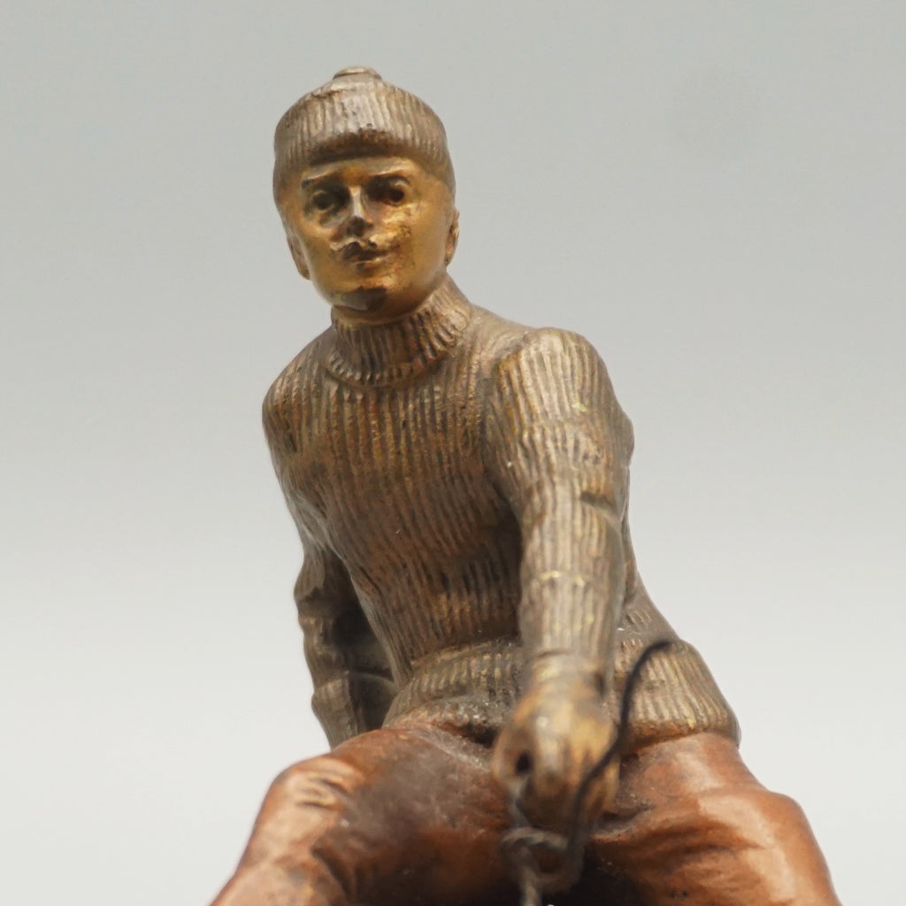 Franz Bergman Bronze Figure of a Man Riding a Sledge