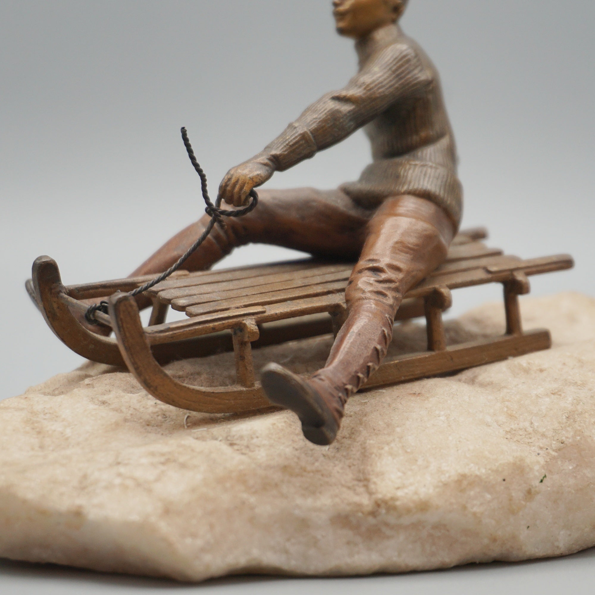 Franz Bergman Bronze Figure of a Man Riding a Sledge