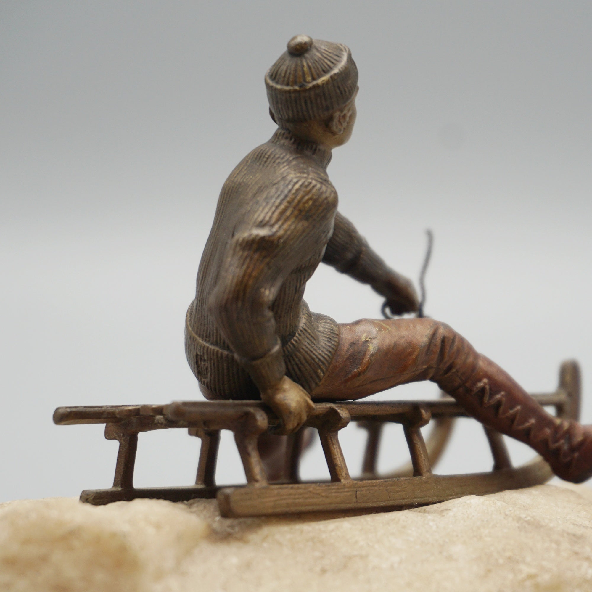 Franz Bergman Bronze Figure of a Man Riding a Sledge