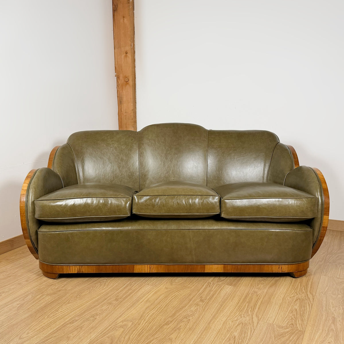 Stunning Art Deco Cloud Sofa with Burr Ash Wraparound Veneers and Green Leather Re-upholstery | Markies Antiques Ltd 