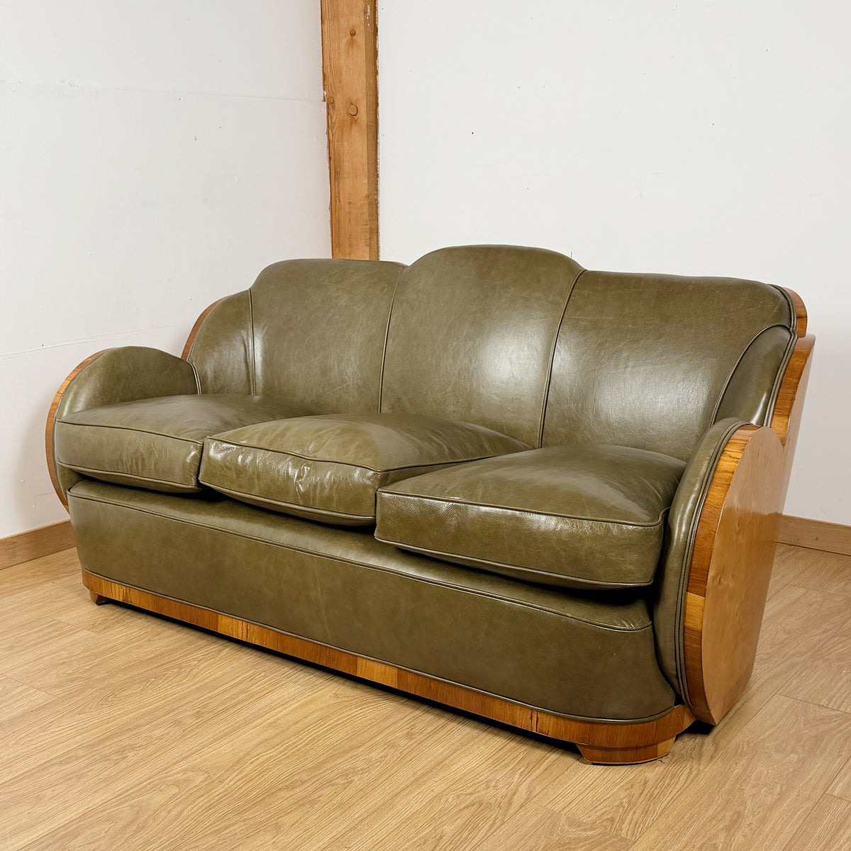 Stunning Art Deco Cloud Sofa with Burr Ash Wraparound Veneers and Green Leather Re-upholstery | Markies Antiques Ltd 