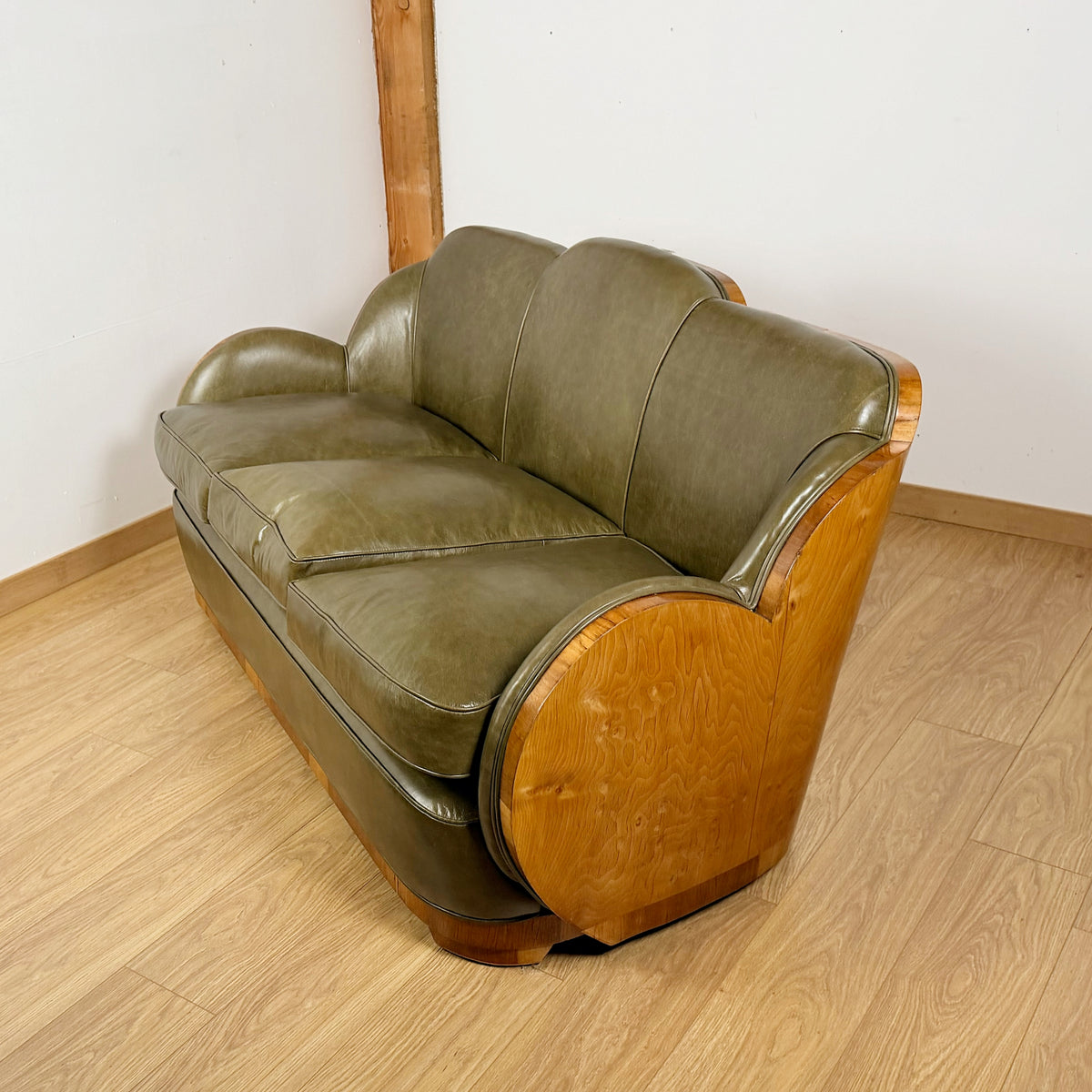 Stunning Art Deco Cloud Sofa with Burr Ash Wraparound Veneers and Green Leather Re-upholstery | Markies Antiques Ltd 