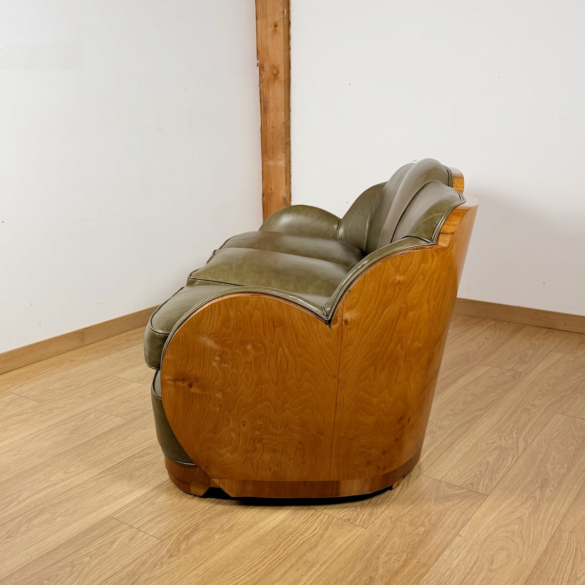 Stunning Art Deco Cloud Sofa with Burr Ash Wraparound Veneers and Green Leather Re-upholstery | Markies Antiques Ltd 