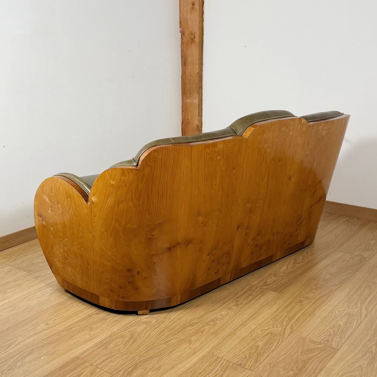 Stunning Art Deco Cloud Sofa with Burr Ash Wraparound Veneers and Green Leather Re-upholstery | Markies Antiques Ltd 