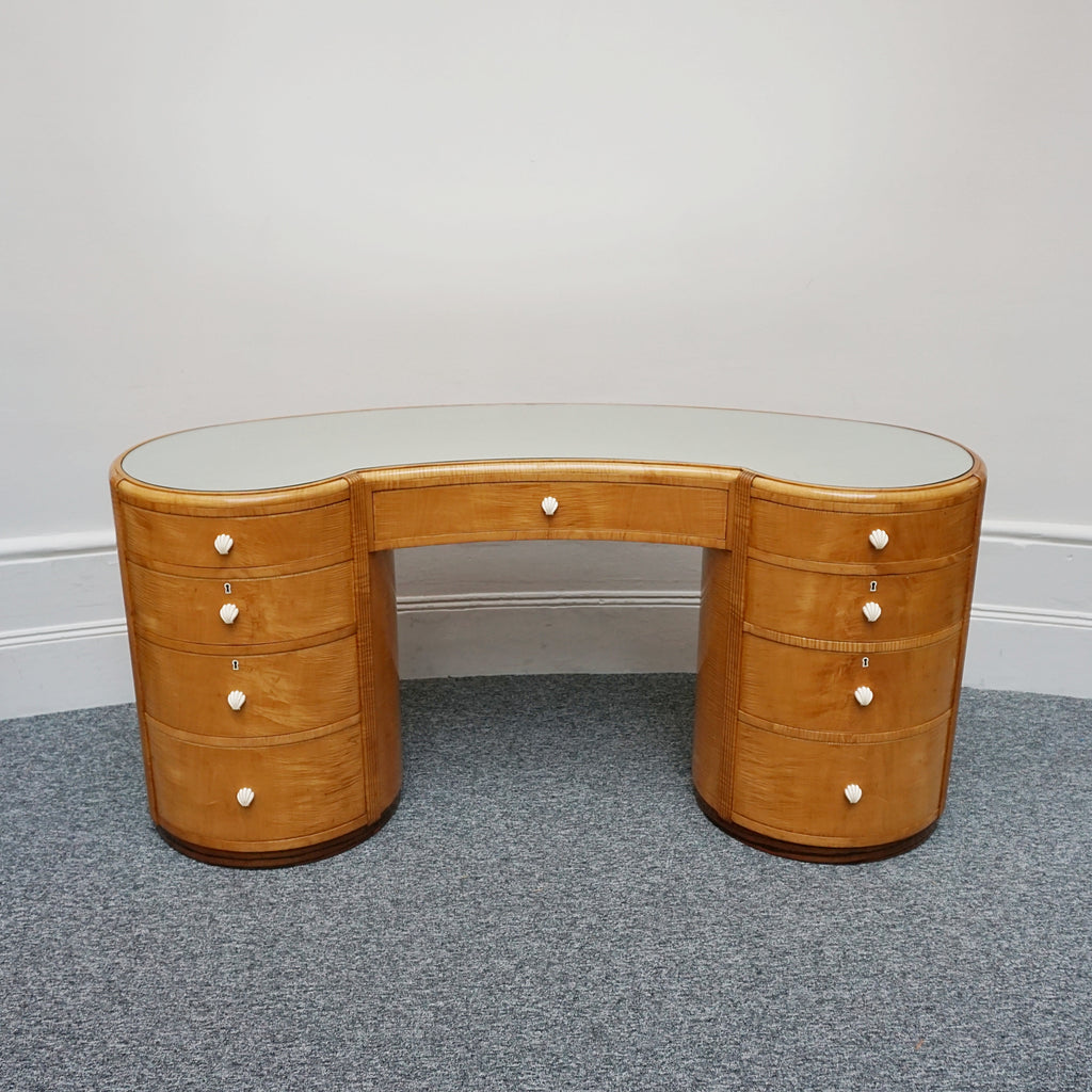An Art Deco Desk by Betty Joel. Satin birch veneered with macassar ebony banding to base. Glass mirrored top with original ivory hand carved shell handles. 1930 dressing table, art deco desk - Jeroen Markies Art Deco