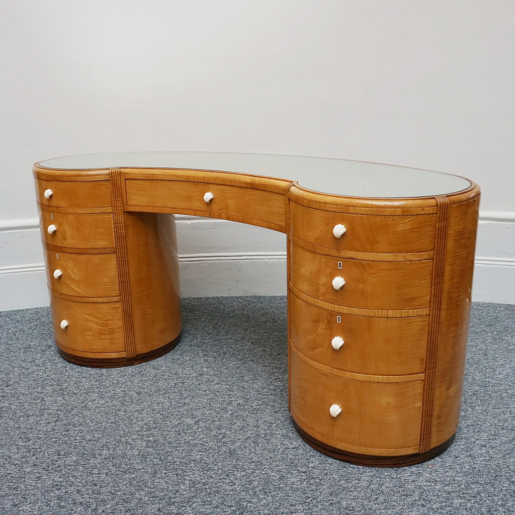 An Art Deco Desk by Betty Joel. Satin birch veneered with macassar ebony banding to base. Glass mirrored top with original ivory hand carved shell handles. 1930 dressing table, art deco desk - Jeroen Markies Art Deco