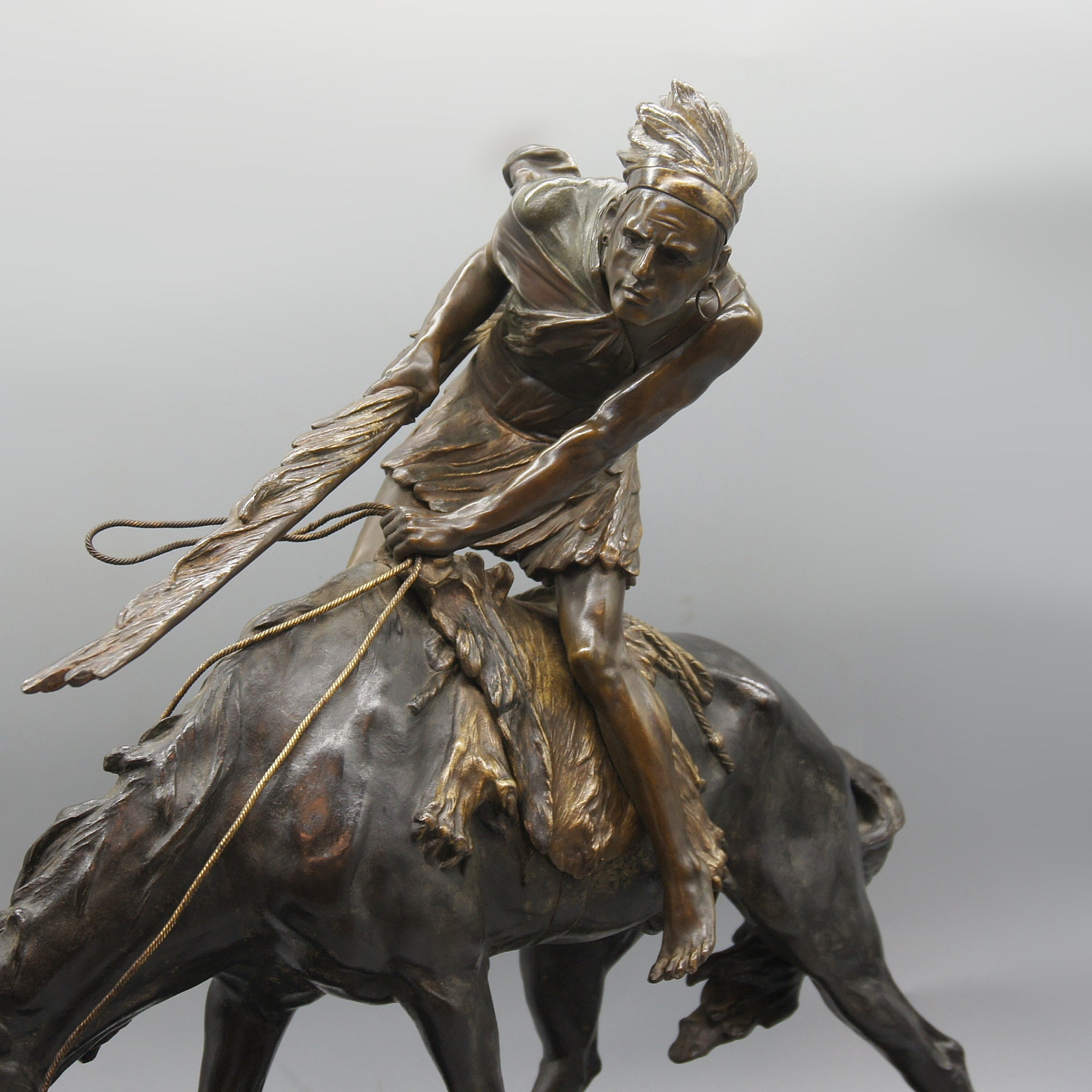 Patinated Bronze Sculpture by Edouard Drouot Depicting a Native American on Horseback - Markies Antiques Ltd