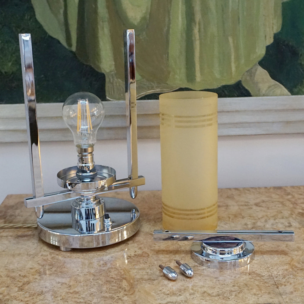 All of our lighting is fully refurbished, re-wired, and re-chromed with some replacement parts. 