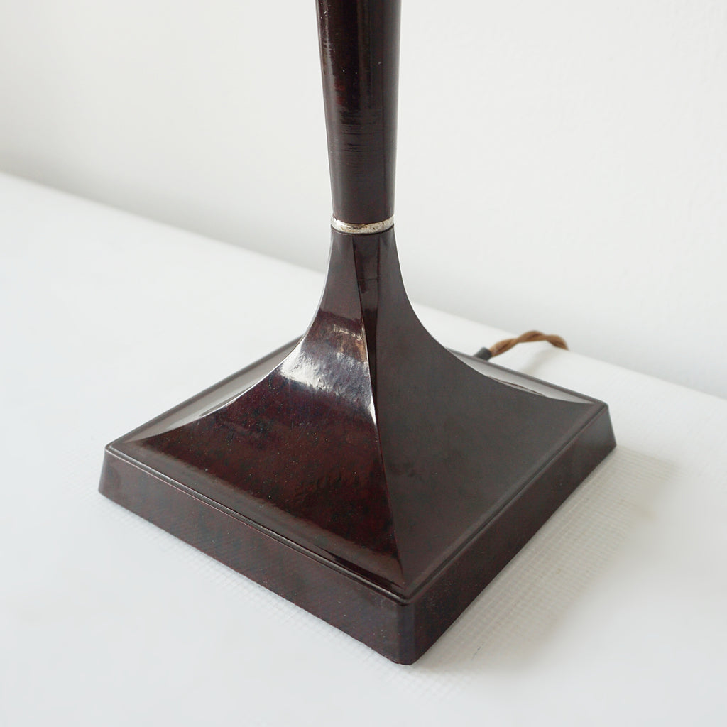 An Art Deco style table lamp. Brown bakelite square stem with peach pink glass globe shade - Jeroen Markies Art Deco