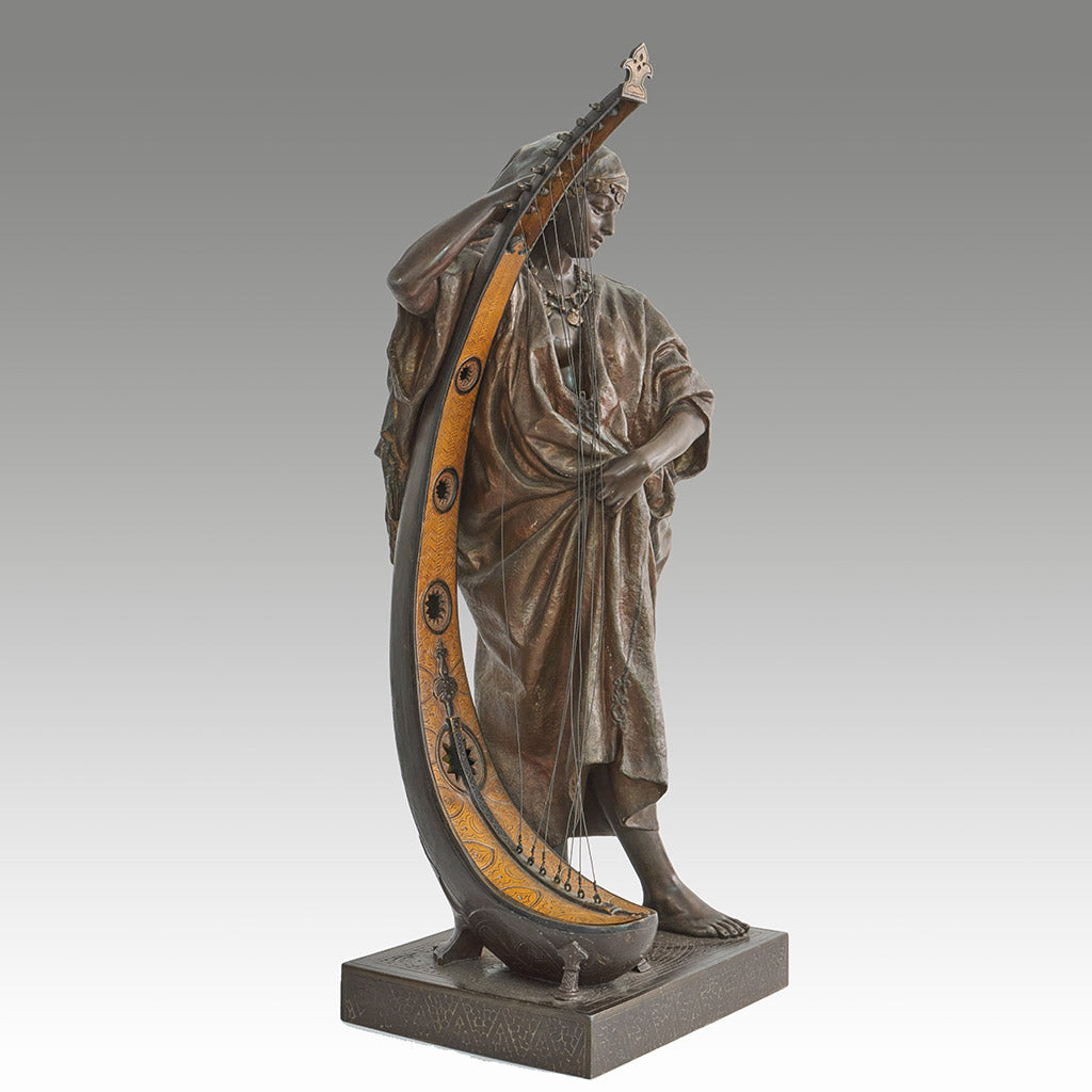 Late 19th Century Bronze. Spelter and enamel with cream yellow patination. Harp playing figure. - Jeroen Markies Art Deco