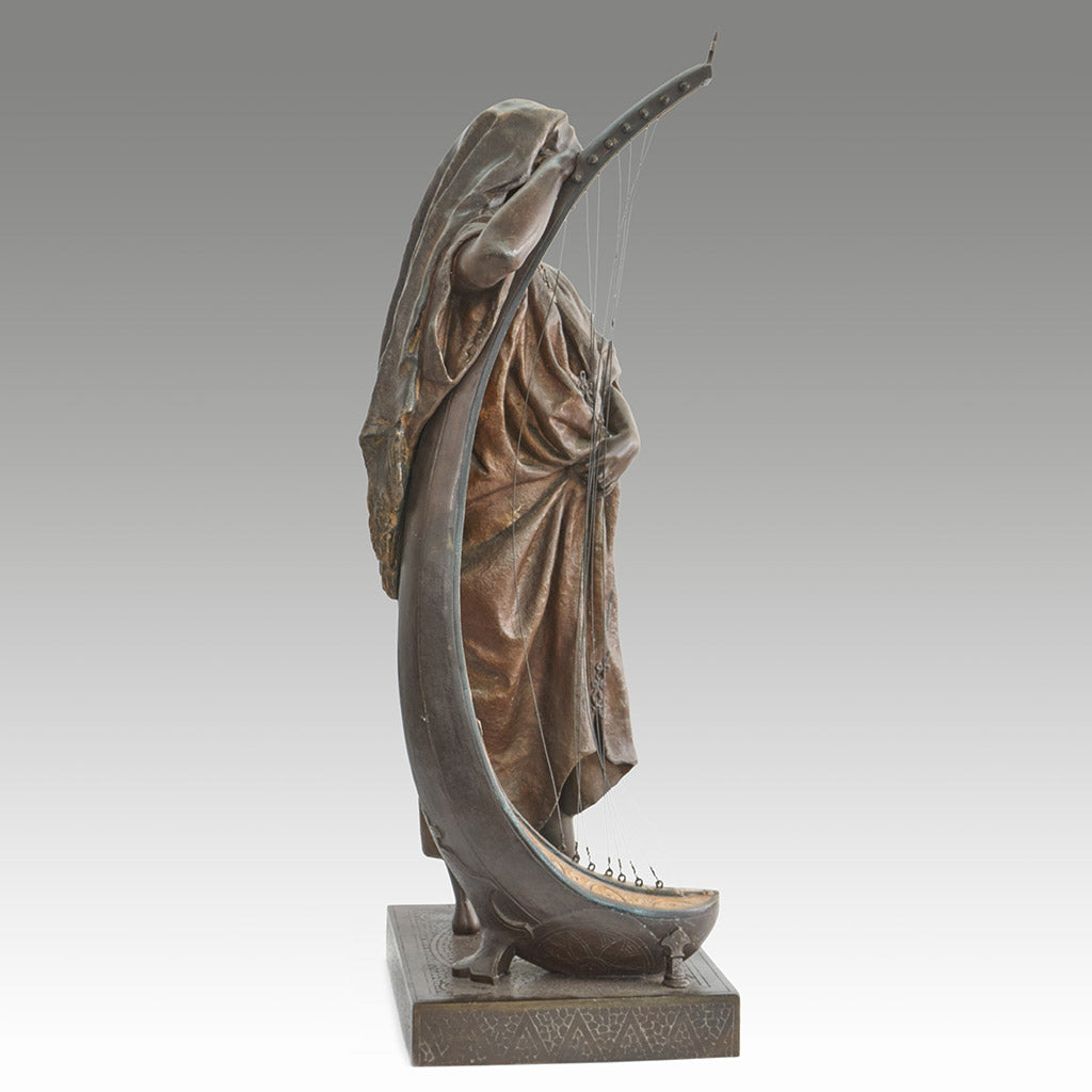 Late 19th Century Bronze. Spelter and enamel with cream yellow patination. Harp playing figure. - Jeroen Markies Art Deco