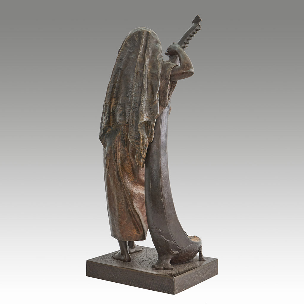 Late 19th Century Bronze. Spelter and enamel with cream yellow patination. Harp playing figure. - Jeroen Markies Art Deco