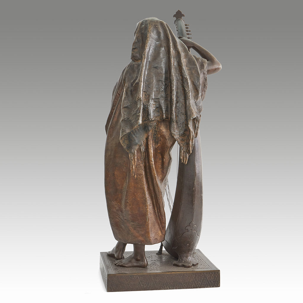 Late 19th Century Bronze. Spelter and enamel with cream yellow patination. Harp playing figure. - Jeroen Markies Art Deco