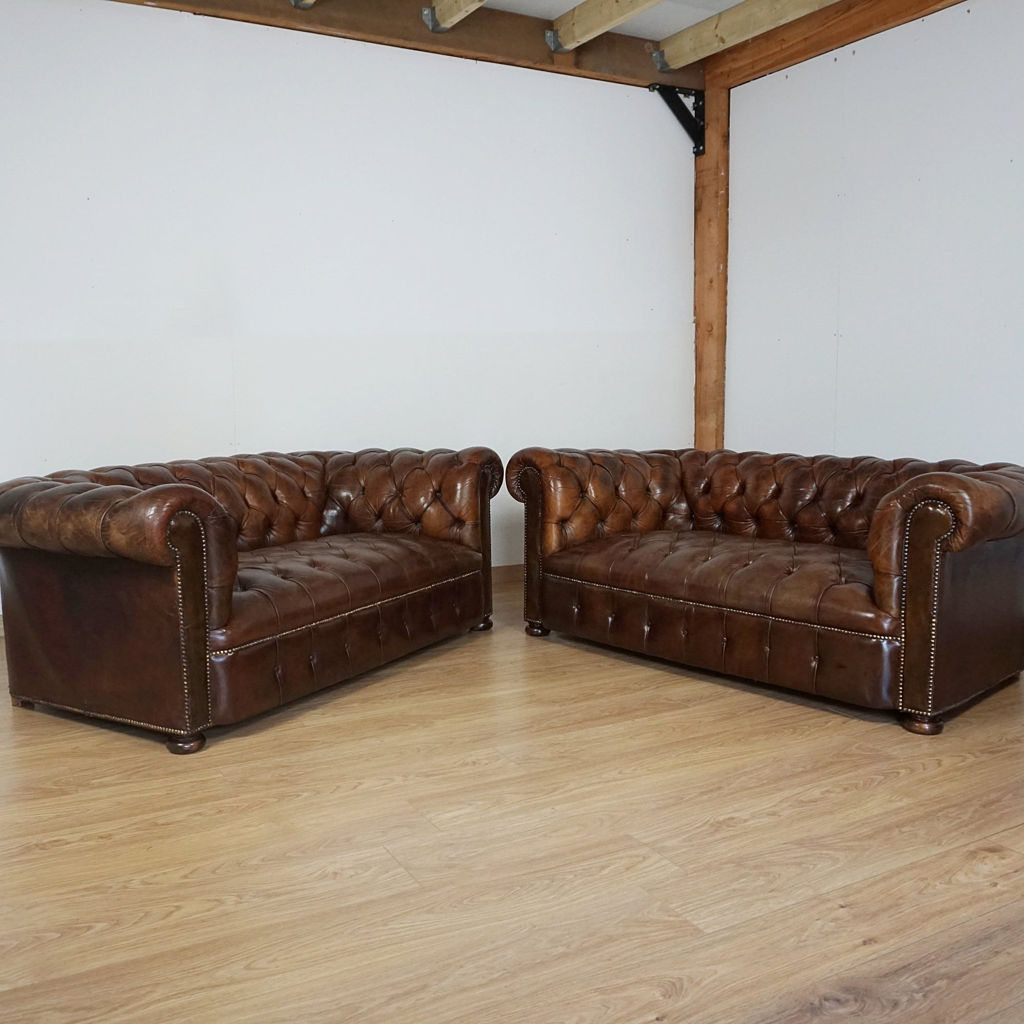 Pair of 1920's Leather upholstered chesterfield sofa's - Jeroen Markies Art Deco