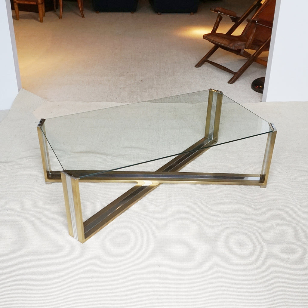 A Mid-Century coffee table designed by Romeo Rega. Brass and chrome X-frame base with inset glass top - Jereon Markies Art Deco