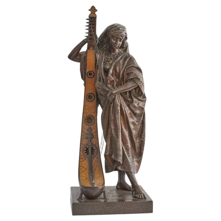 Late 19th Century Bronze. Spelter and enamel with cream yellow patination. Harp playing figure. - Jeroen Markies Art Deco