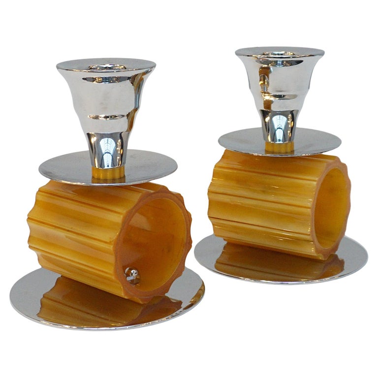 A pair of Art Deco style candlesticks. Amber bakelite, chrome. Jeroen Markies Art Deco