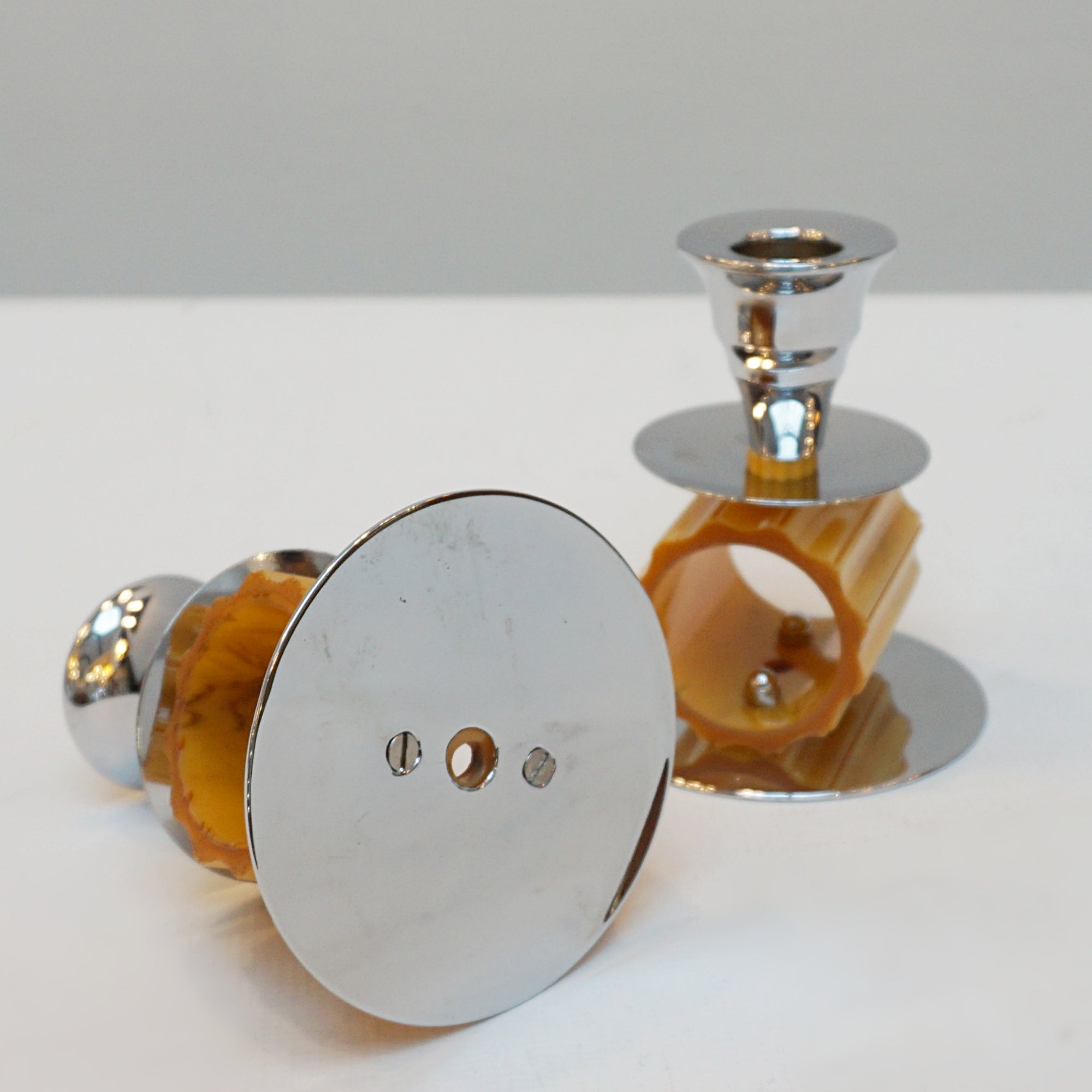 A pair of Art Deco style candlesticks. Amber bakelite, chrome. Jeroen Markies Art Deco