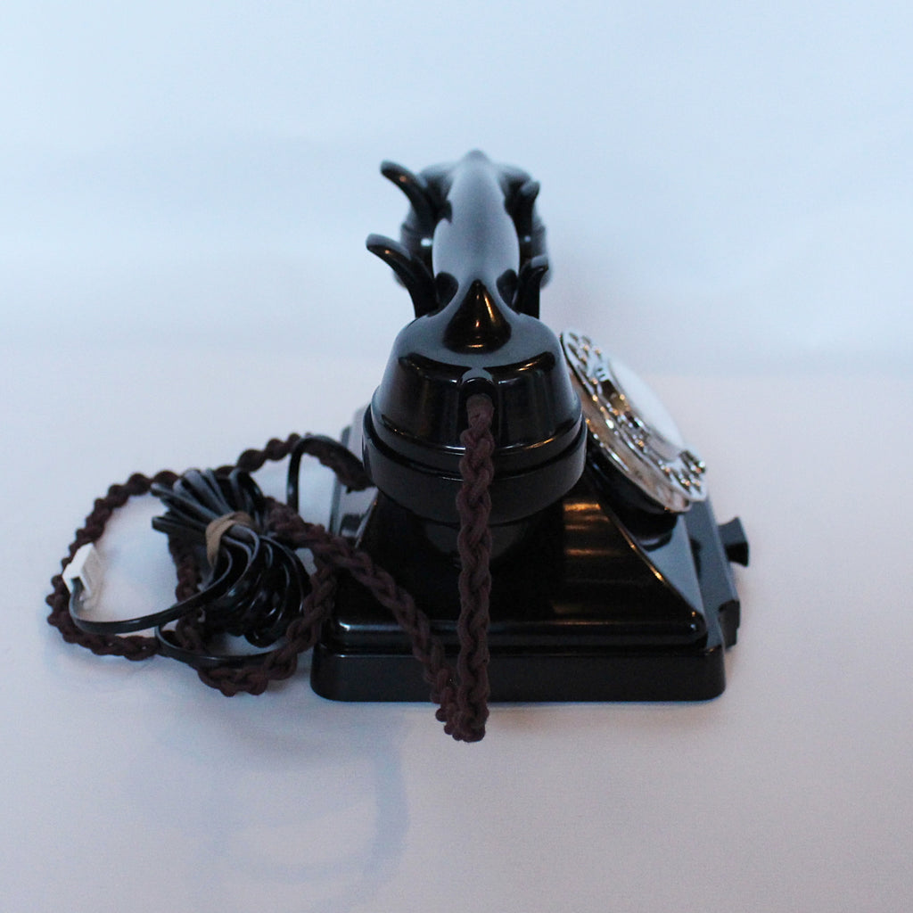 An original GPO telephone in black bakelite. With integral drawer at Jeroen Markies.