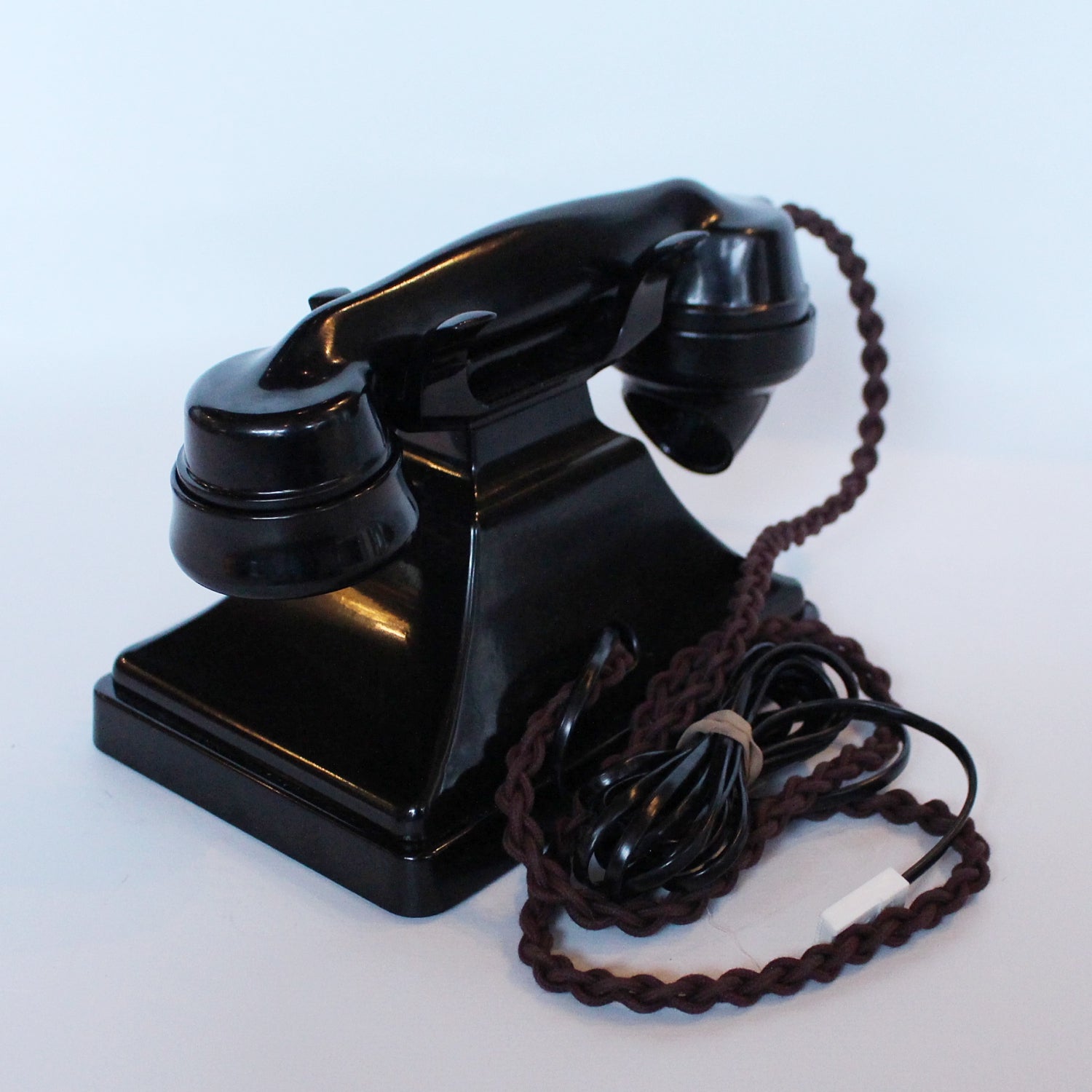 An original GPO telephone in black bakelite. With integral drawer at Jeroen Markies.
